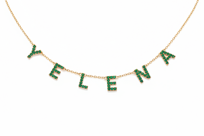 Collier YELENA cristaux verts fond blanc